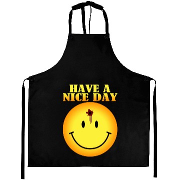 Discover smiley face bullet hole Aprons