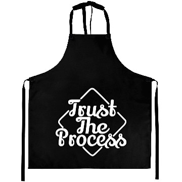 Discover Trust the process Aprons