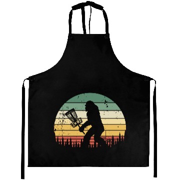 Discover Funny Bigfoot Disc Golf Trees Vintage Sunset Aprons