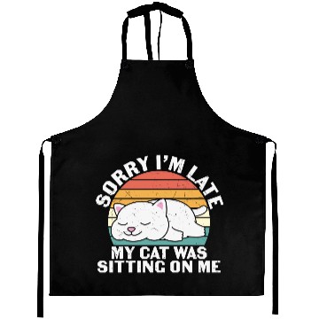 Discover Sorry I'm late, my cat was sitting on me Aprons