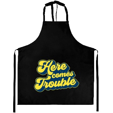 Discover Here Comes Trouble Aprons
