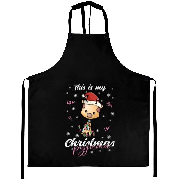 Discover Winter Christmas Pyjama Giraffe Aprons