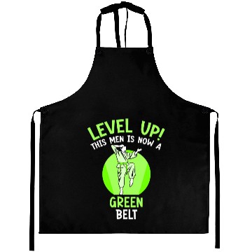 Discover Level Up! This men is now a green belt Aprons