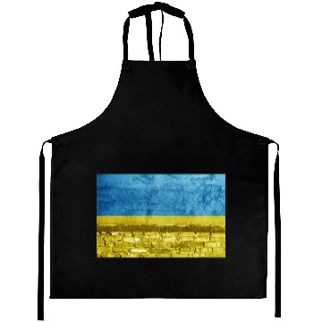 Discover Brick wall with Ukraine flag Aprons