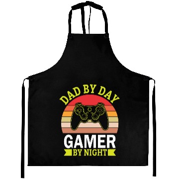 Discover Dad by day gamer by night Aprons