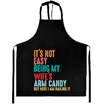 Discover It's Not Easy Being My Wife's Arm Candy Aprons