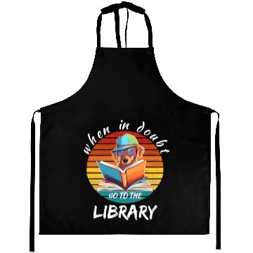 Discover When in doubt got to the library, reading dog Aprons