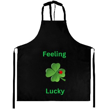 Discover Feeling Lucky with a 4 leaf clover and a ladybug Aprons