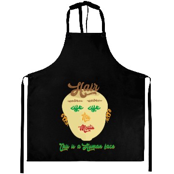 Discover this is a human face Aprons