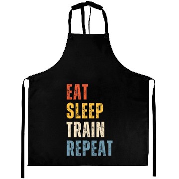 Discover EAT SLEEP TRAIN REPEAT Aprons