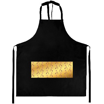 Discover Christmas candy canes on a golden imitation backgr Aprons