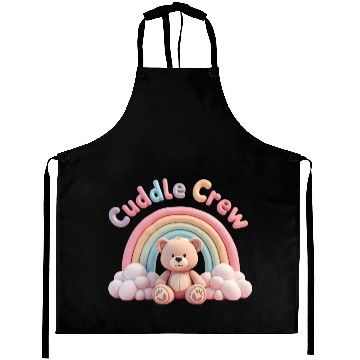 Discover Soft teddy bear sitting under a rainbow Aprons