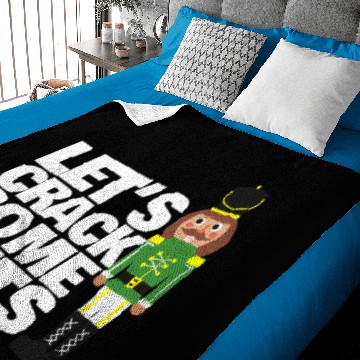 Discover Lets Crack Some Nuts funny Christmas nutcracker Baby Blankets