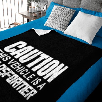 Discover Caution This Vehicle is a Transformer Baby Blankets