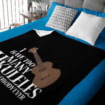 Discover Too Many Ukuleles Baby Blankets
