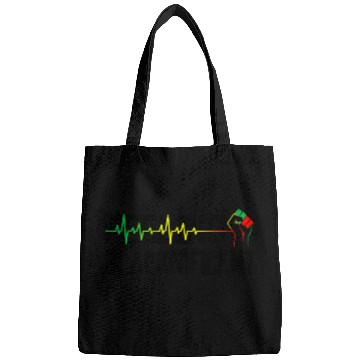 Discover black power fist feeling blacknificent heartbeat Bags