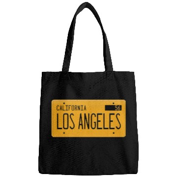 Discover Los Angeles California 1956 yellow license plate Bags