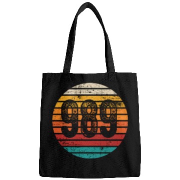 Discover Distressed Vintage Sunset 989 Area Code Bags