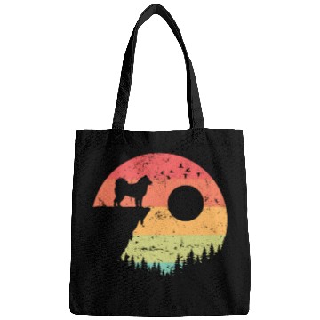 Discover Alaskan Malamute at Sunrise in the Forest Bags