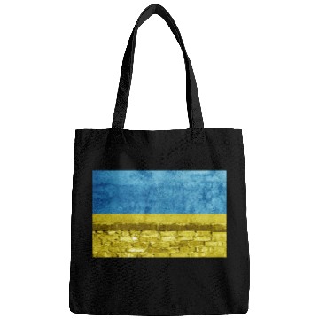 Discover Brick wall with Ukraine flag Bags