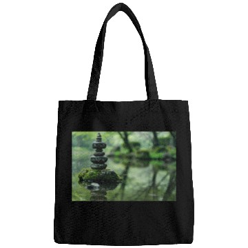 Discover Zen Stone Stack Reflected in Tranquil Pond Bags