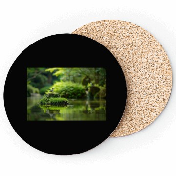 Discover Serene Pond with Bird on Mossy Rock Coasters
