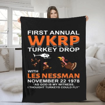 Discover First Anual WKRP Turkey Drop with Les Ness Fleece Blankets