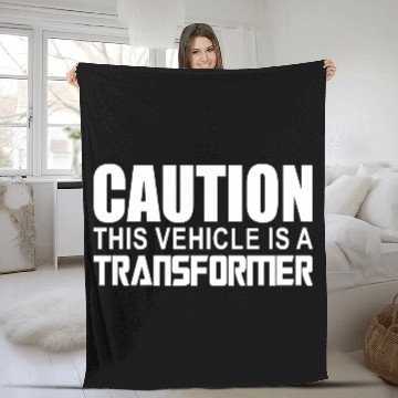 Discover Caution This Vehicle is a Transformer Fleece Blankets