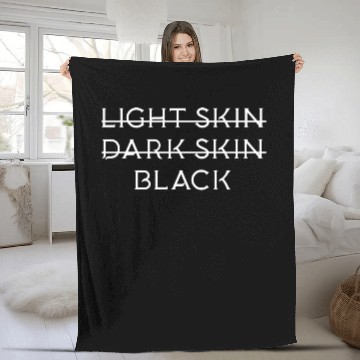 Discover Not light skin or dark skin black Fleece Blankets