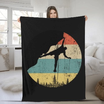 Discover Rock climbing mountain climber Fleece Blankets