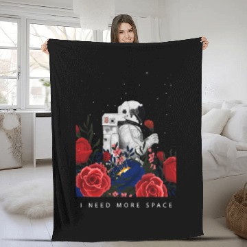 Discover Cool space astronaut holding flowers Fleece Blankets