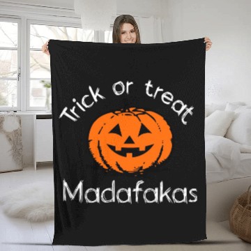 Discover Halloween smiling pumpkin trick or treat madafakas Fleece Blankets