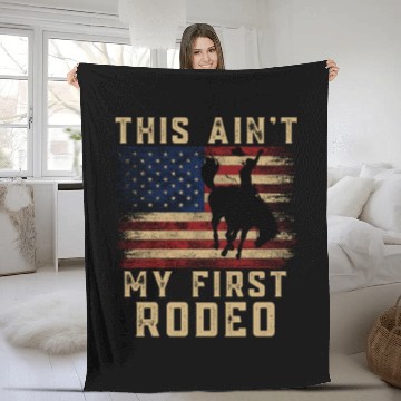 Discover THIS AIN'T MY FIRST RODEO Fleece Blankets