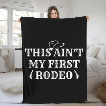 Discover THIS AIN'T MY FIRST RODEO Fleece Blankets