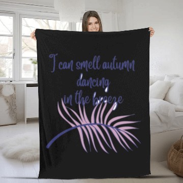 Discover Autumn dancing in the breeze Fleece Blankets