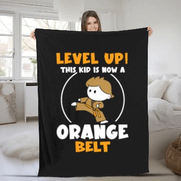 Discover Level Up! This kid is now a green belt Fleece Blankets