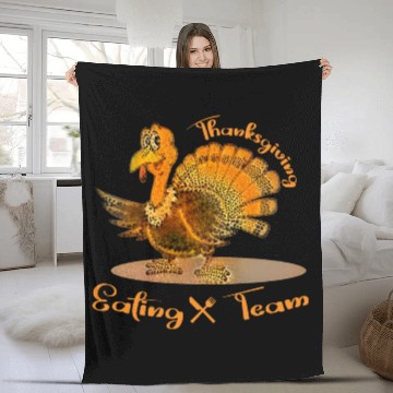 Discover Thanksgiving eating team Fleece Blankets