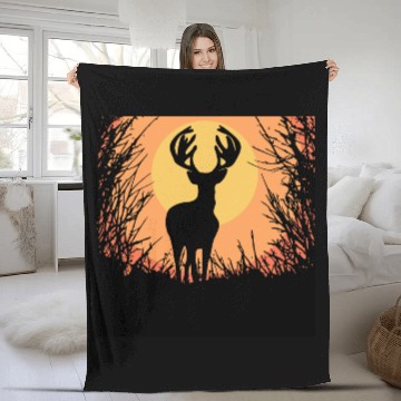 Discover Deer Sunset in the woods Fleece Blankets