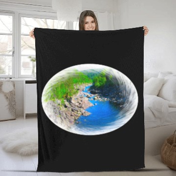Discover A river running through a valley in the wilderness Fleece Blankets