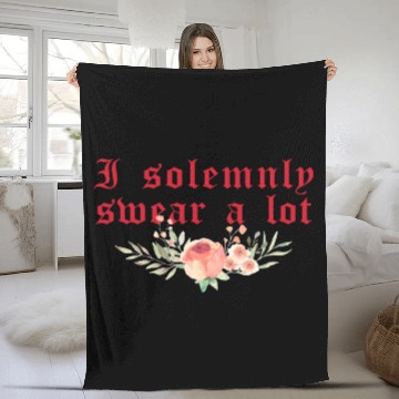 Discover Funny saying: I solemnly swear a lot Fleece Blankets