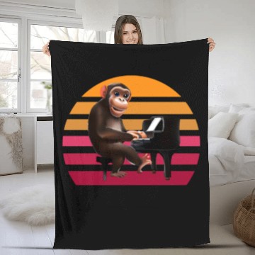 Discover Monkey at the piano Fleece Blankets