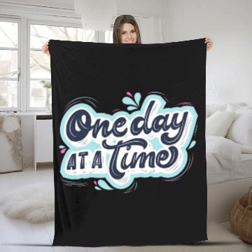 Discover One day at a time Fleece Blankets
