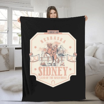 Discover sidney nebraska wild west town Fleece Blankets