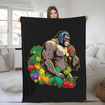 Discover gorilla eating fruit Fleece Blankets