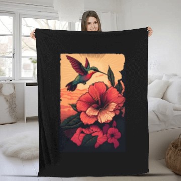 Discover Hummingbird flies over hibiscus flower Tropical Fleece Blankets