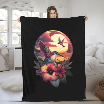 Discover Hummingbird flies over hibiscus flower Tropical Fleece Blankets