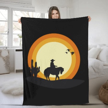 Discover sunset cowboy Fleece Blankets