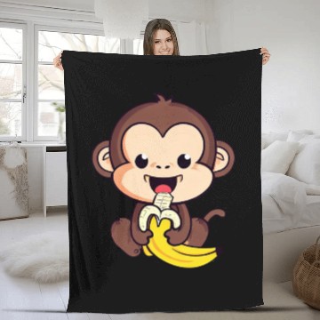 Discover cute monkey eats a banana Fleece Blankets