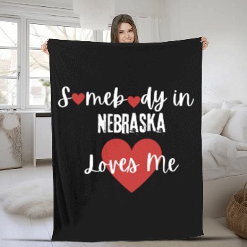 Discover Somebody in Nebraska Loves Me Fleece Blankets