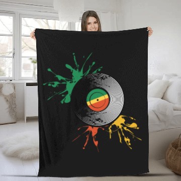Discover Rastafarian flag and vinyl record. Fleece Blankets
